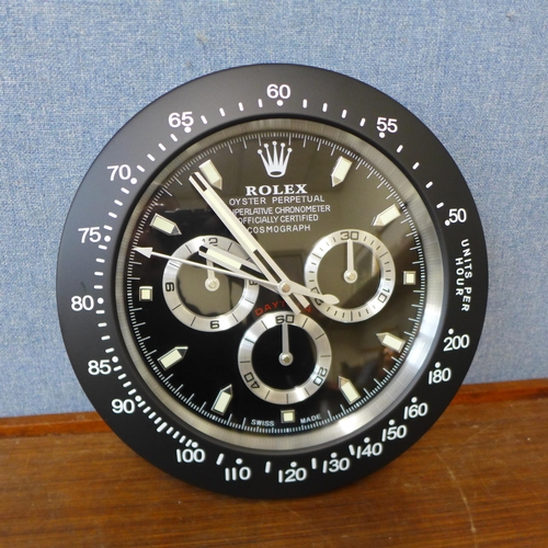 356 - A Rolex style dealer's display wall clock