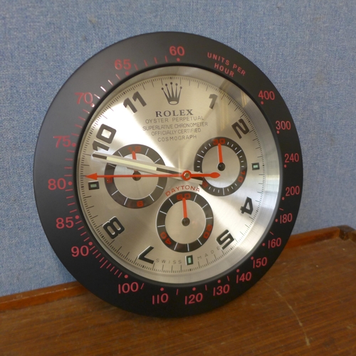 357 - A Rolex style dealer's display wall clock