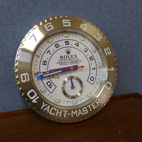 358 - A Rolex style dealer's display wall clock