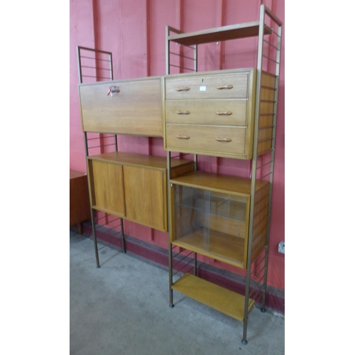 4 - A Staples teak and gold metal two bay Ladderax room divider