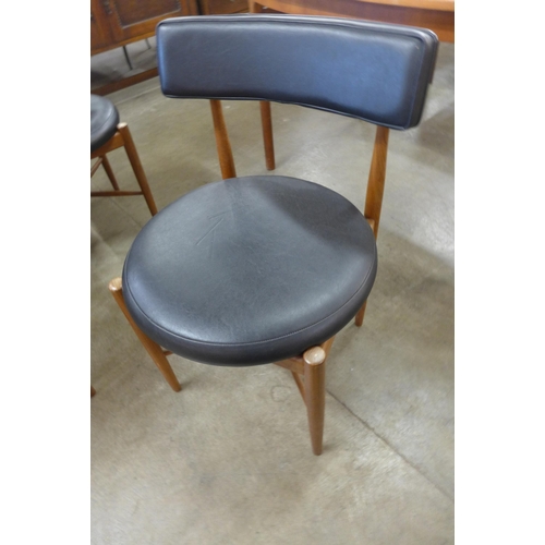 49 - A set of four G-Plan Fresco teak and black vinyl dining chairs