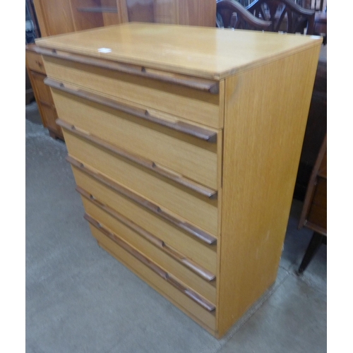 54 - A teak chest of drawers