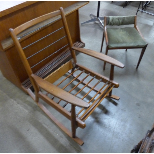 60D - A teak rocking chair and a teak and upholstered stool