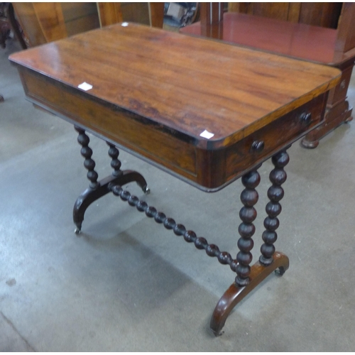 67 - A Victorian rosewood single drawer stretcher table