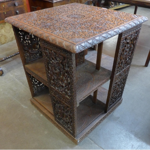 69A - A 19th Century Burmese carved hardwood floor standing bookstand