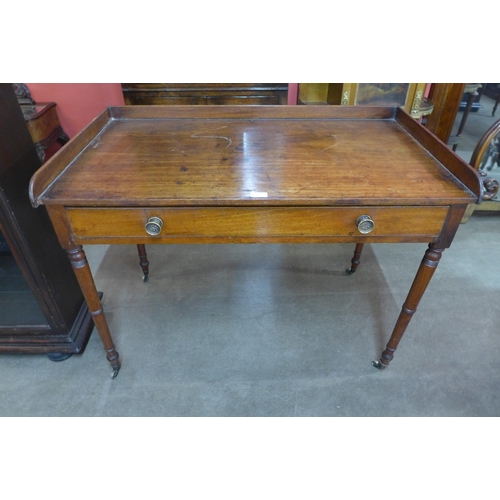 76 - A George IV mahogany single drawer writing table