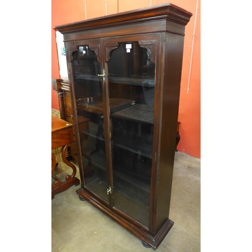 78 - A Victorian stained pine and beech two door bookcase