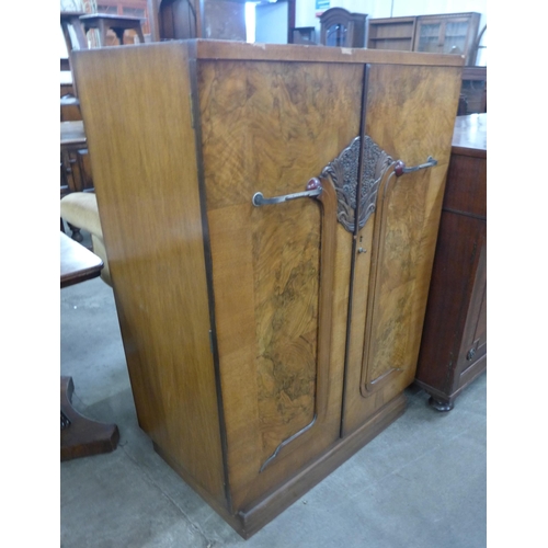 95 - An Art Deco fitted burr walnut tallboy