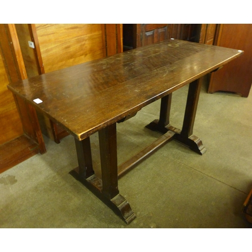 96 - An Arts and Crafts oak refectory table