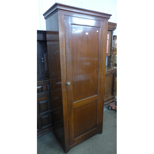 98 - A late Victorian mahogany single door railway waiting room cupboard