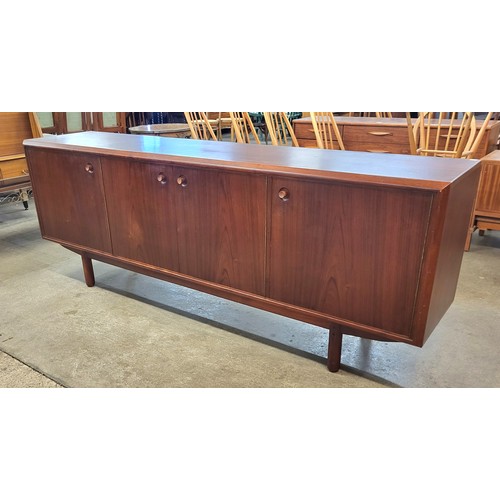 35 - A Younger teak fitted four door sideboard, designed by John Herbert