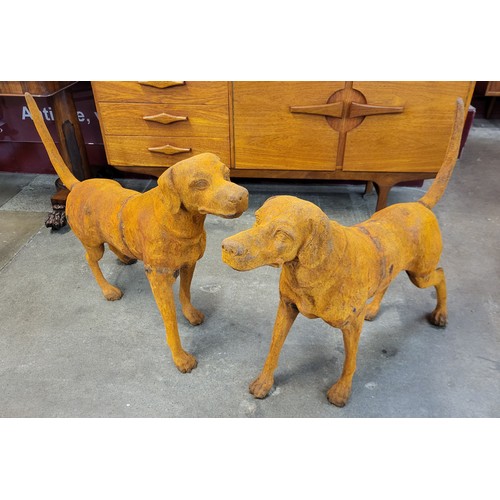 246B - A pair of large cast iron garden figures of dogs