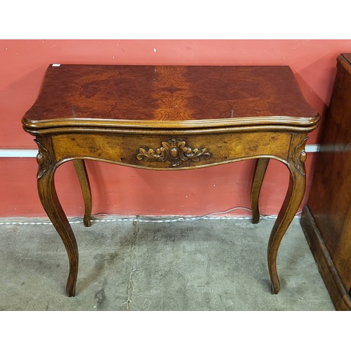 72 - A 19th Century style French burr walnut serpentine fold over card table