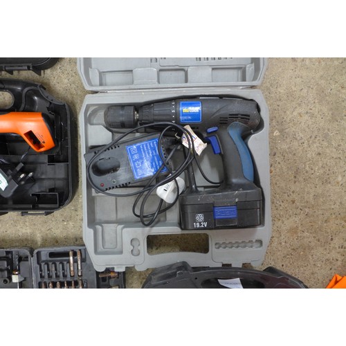 2008 - 5 Cased tools - two drills, power saw, electric screw driver and a cased drill bit set