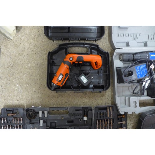 2008 - 5 Cased tools - two drills, power saw, electric screw driver and a cased drill bit set