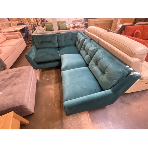 1347 - A turquoise velvet upholstered corner sofa