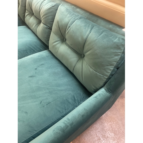 1347 - A turquoise velvet upholstered corner sofa