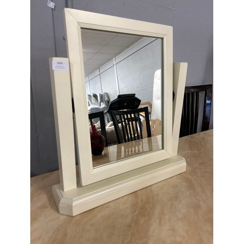 1606 - A white swing mirror