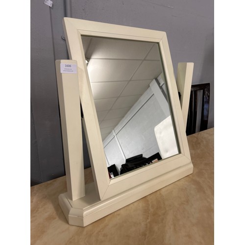 1606 - A white swing mirror