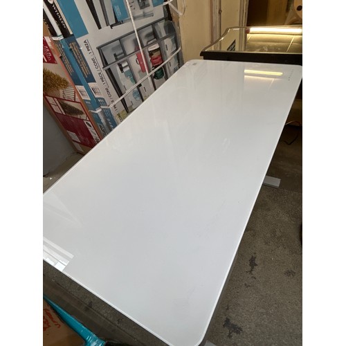 1512 - A white glass and steel adjustable desk