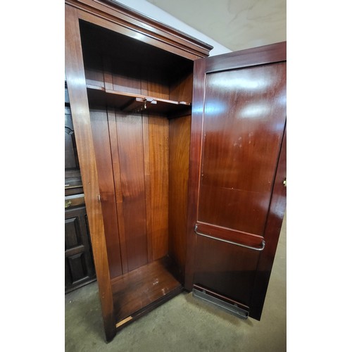 98 - A late Victorian mahogany single door railway waiting room cupboard