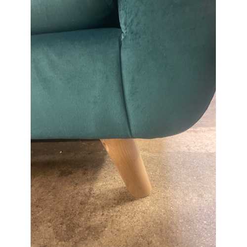 1320 - A turquoise velvet upholstered corner sofa