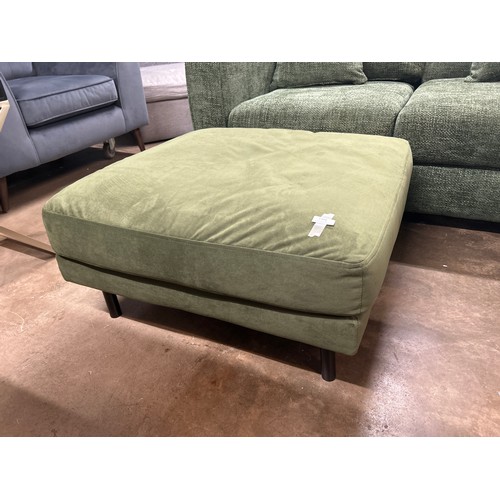 1402 - A green velvet upholstered cushion topped footstool