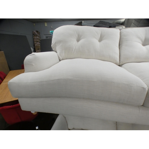 1410 - An ivory upholstered three and two seater sofa on turned legs RRP £1798