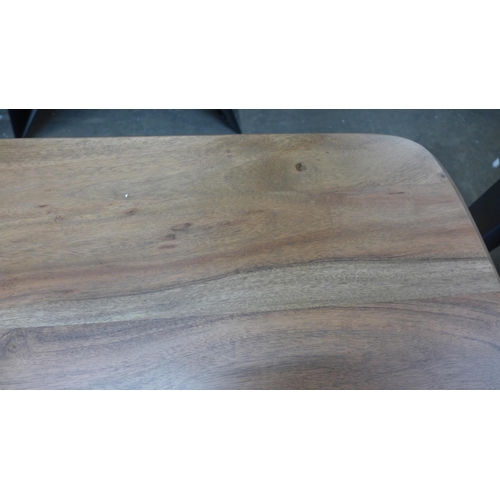 1353 - A Lucio hardwood dining table and two benches * This lot is subject to VAT