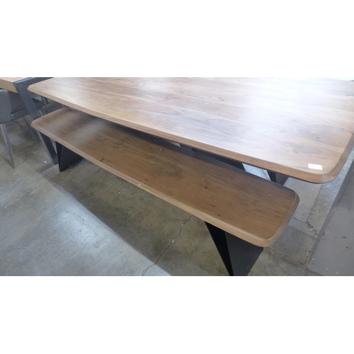 1353 - A Lucio hardwood dining table and two benches * This lot is subject to VAT