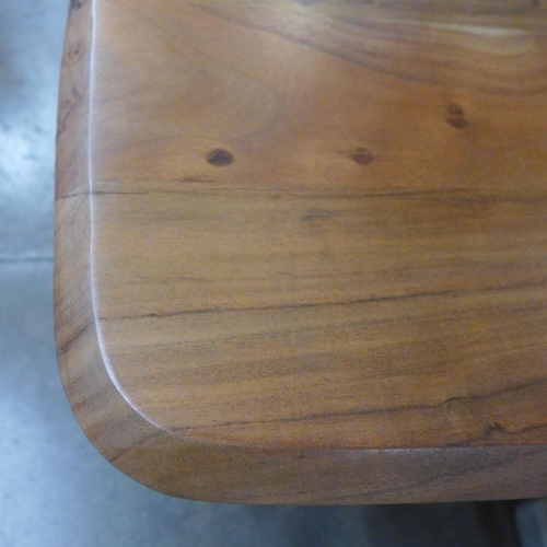 1355 - A Lucio hardwood lamp table * This lot is subject to VAT