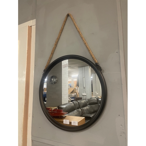 1382 - A medium round black metal mirror on a hanging rope H46cm (JRG1809)