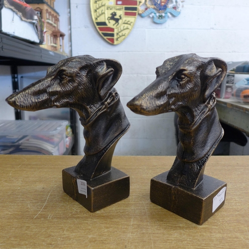 2067 - Two cast greyhound heads * this lot is subject to VAT
