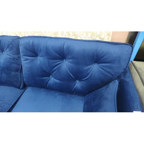 1421 - A Hoxton blue velvet upholstered three seater sofa RRP £799