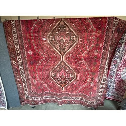 1515 - A fine hand woven, wool pile Persian Quashqai tribal carpet, 293 x 220cm