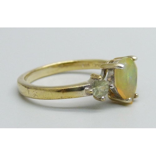 1052 - A silver gilt and Ethiopian opal ring, L