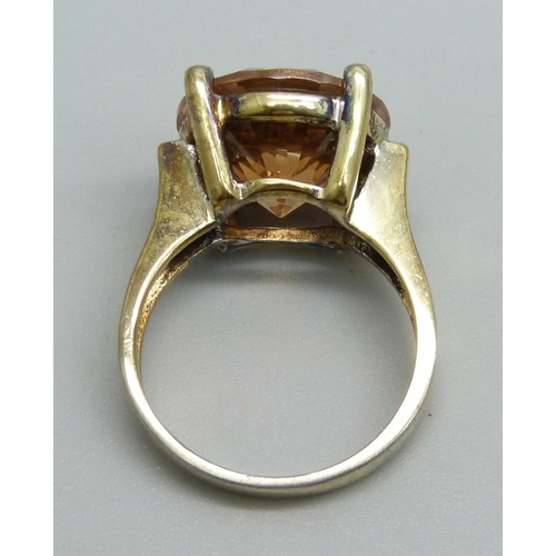 1053 - A silver gilt and citrine ring, N/O