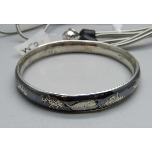 1060 - Two silver bangles, a/f, 29g, and a designer necklace