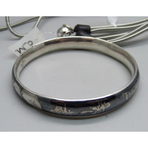 1060 - Two silver bangles, a/f, 29g, and a designer necklace