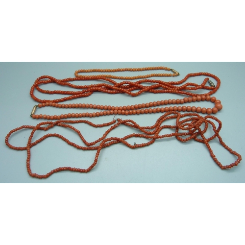 1064 - Four coral necklaces