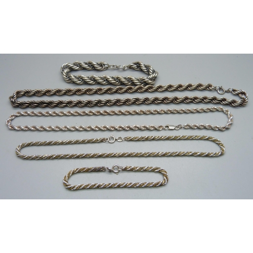 1065 - Three silver necklaces and two silver bracelets, 110g