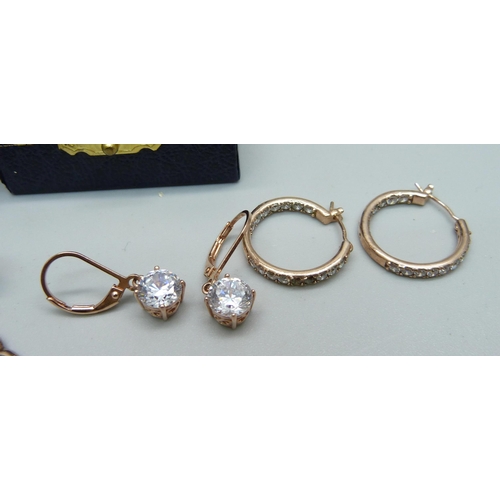 1066 - Two silver gilt rings, N and O, and three pairs of silver gilt earrings