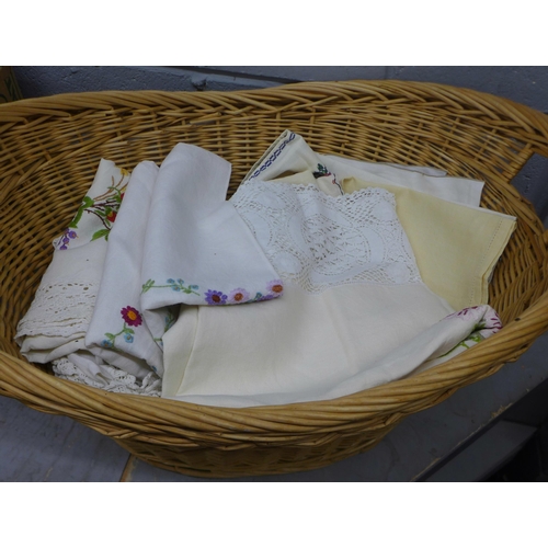 1091 - A wicker basket containing a collection of embroidered linen **PLEASE NOTE THIS LOT IS NOT ELIGIBLE ... 