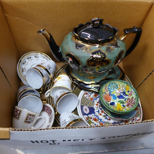 1098 - A Victorian black and green teapot and stand, two Egyptian themed plates, a pair of Argyle collector... 