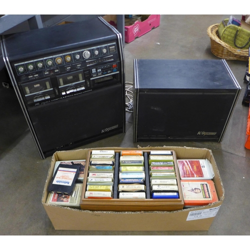 1118 - A box of 8-track music cartridges, approximately 100 and a JVC double cassette deck & 8 track cartri... 