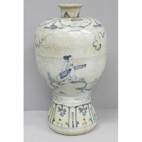 601 - A Chinese 18th Century blue and white bottle vase, 25cm