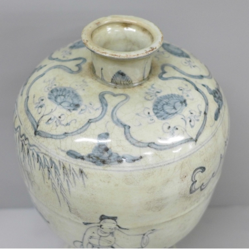 601 - A Chinese 18th Century blue and white bottle vase, 25cm