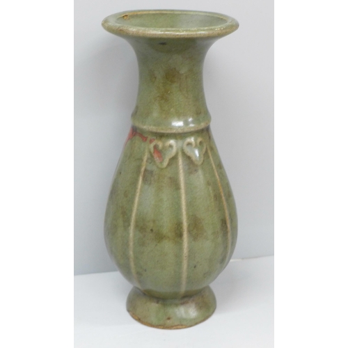 605 - A Chinese celadon vase, 18cm, chips to base