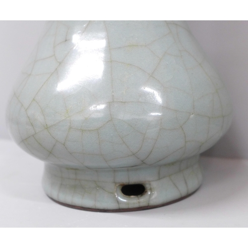 610 - A Chinese celadon crackle-glaze vase, 22cm