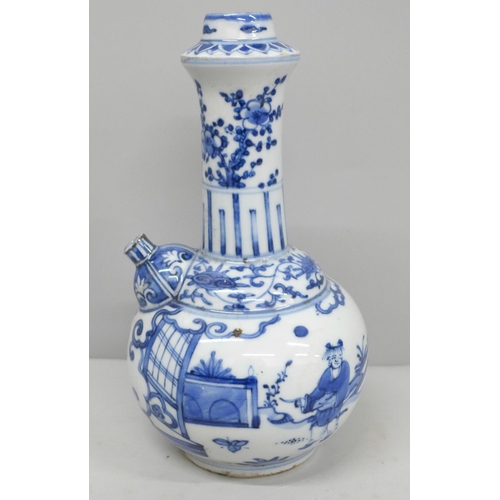 619 - A Chinese blue and white kendi with six character mark to base, 21cm